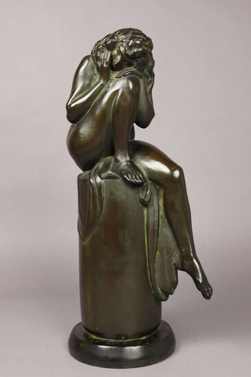 Seated woman by Henry Arnold