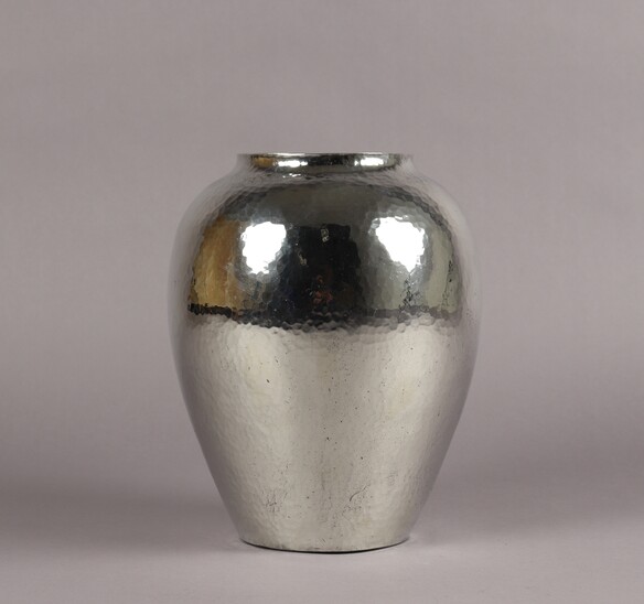 Silvered metal vase by Jean Després